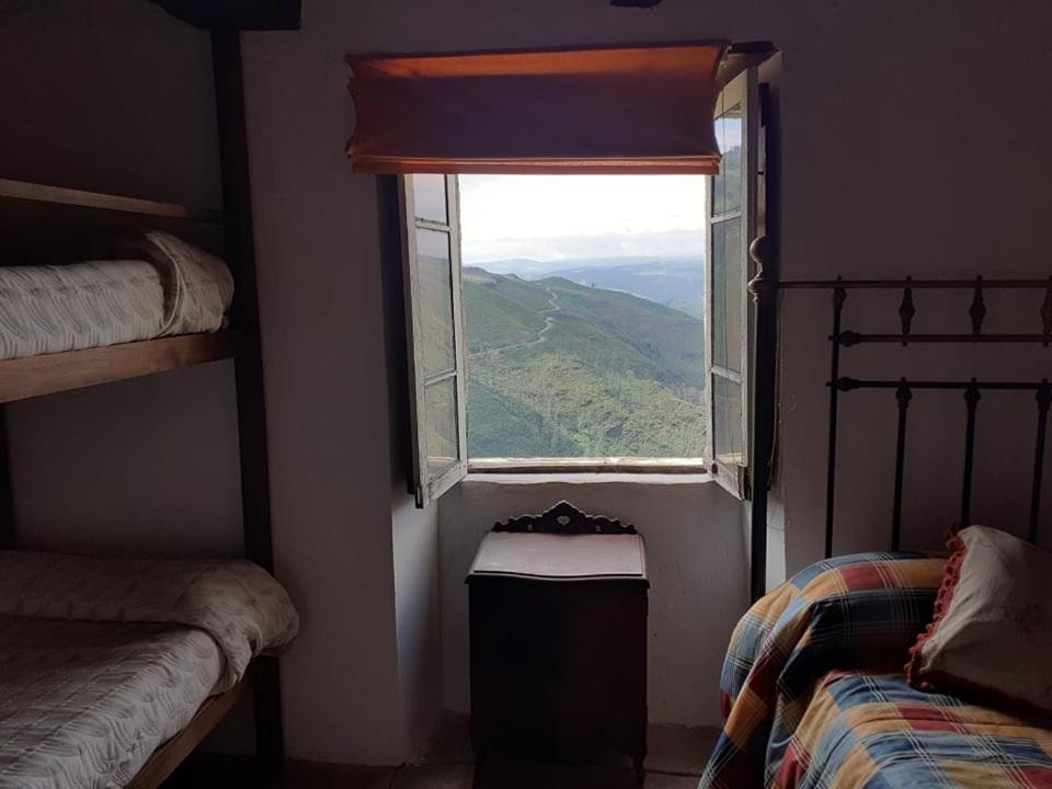 לוגו Albergue Escanlar מראה חיצוני תמונה